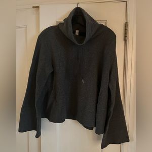 Cozy pullover perfect for a chilly evening in the summer!